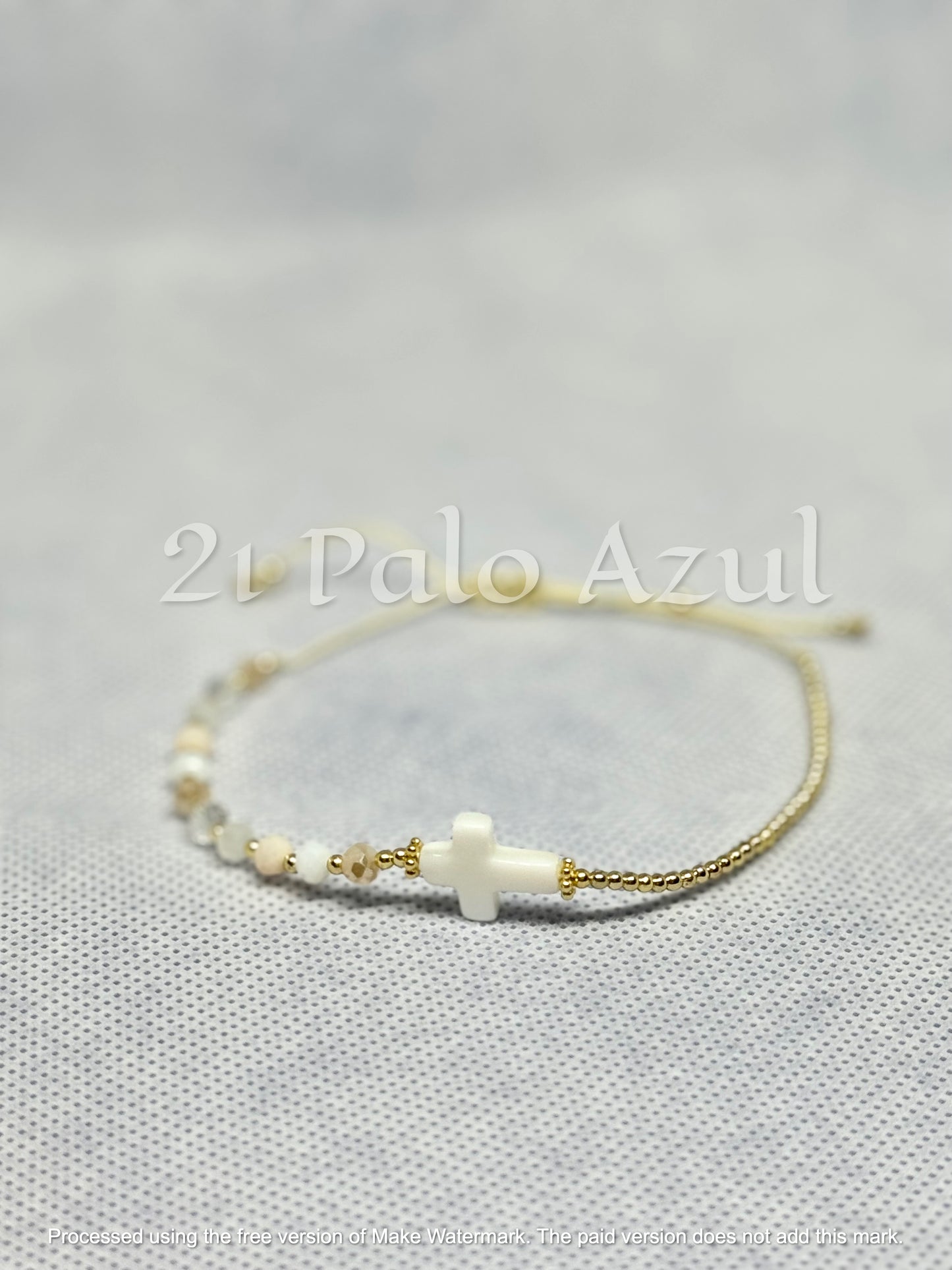 Pulsera de Crucifijo tejida y con cuentas