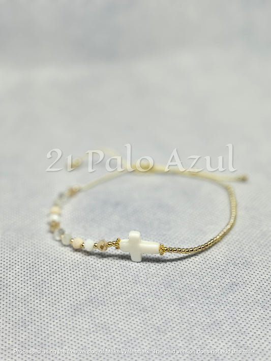 Pulsera de Crucifijo tejida y con cuentas